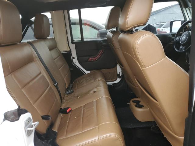 Photo 11 from auction – 2011 JEEP WRANGLER U with VIN 1J4BA5H13BL572501