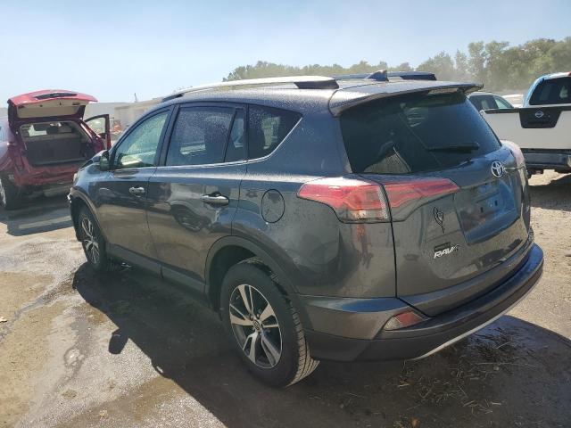 Photo 2 from auction – 2017 TOYOTA RAV4 XLE with VIN JTMWFREV2HD099863