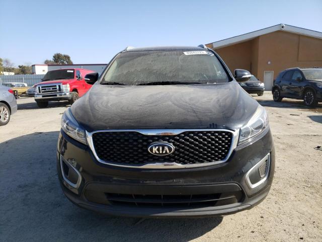 Photo 5 from auction – 2016 KIA SORENTO LX with VIN 5XYPG4A55GG182861