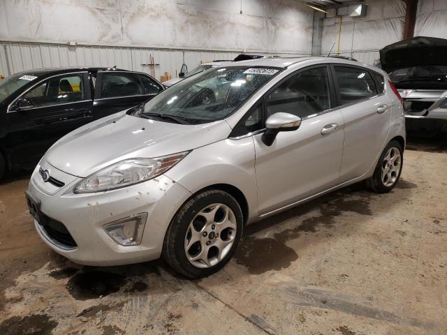 FORD FIESTA SES 2011 with VIN 3FADP4FJ9BM121541 - Photo from auction
