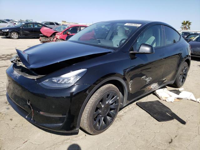 TESLA MODEL Y 2021 with VIN 5YJYGDEE3MF117136 - Photo from auction