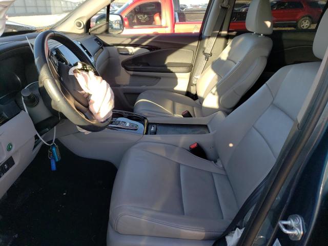 Photo 7 from auction – 2021 HONDA PILOT TOUR with VIN 5FNYF5H66MB031882