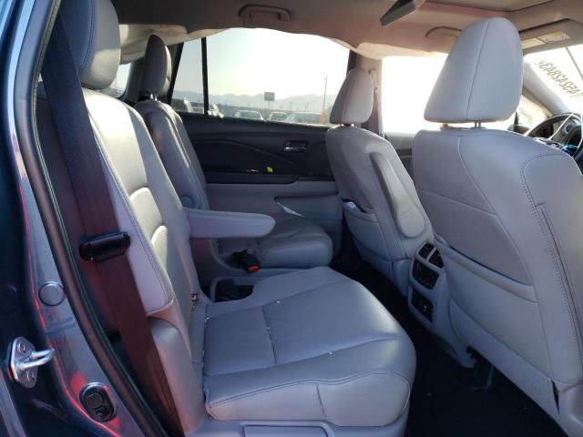 Photo 11 from auction – 2021 HONDA PILOT TOUR with VIN 5FNYF5H66MB031882