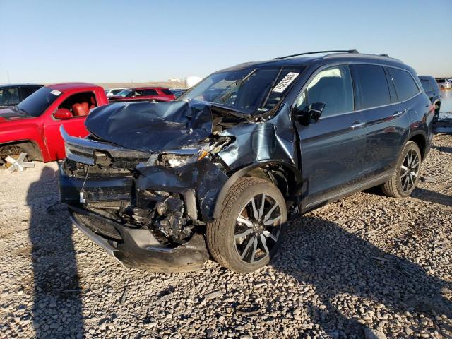 HONDA PILOT TOUR 2021 with VIN 5FNYF5H66MB031882 - Photo from auction