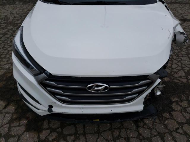 Photo 11 from auction – 2018 HYUNDAI TUCSON SE with VIN KM8J2CA48JU664683