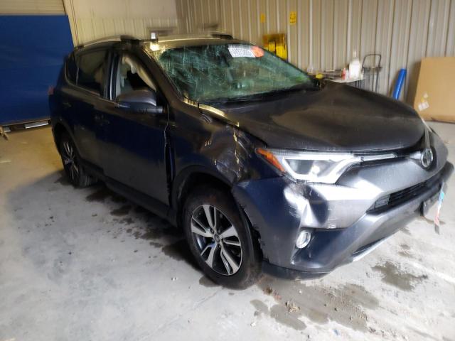Photo 4 from auction – 2017 TOYOTA RAV4 XLE with VIN JTMRFREV0HJ115492