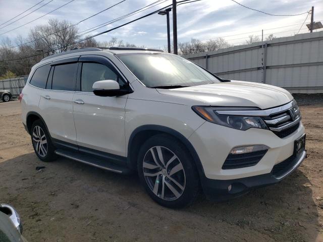 Photo 4 from auction – 2018 HONDA PILOT ELIT with VIN 5FNYF6H03JB069518