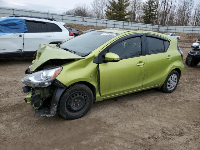 TOYOTA PRIUS C 2015 with VIN JTDKDTB31F1110385 - Photo from auction