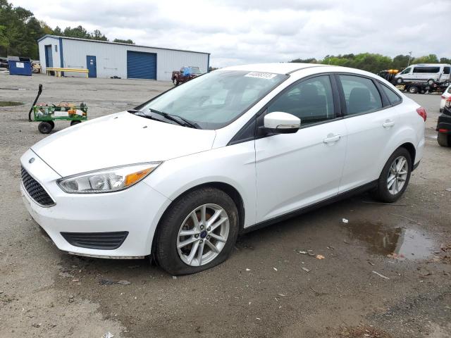 FORD FOCUS SE 2017 with VIN 1FADP3F25HL316386 - Photo from auction