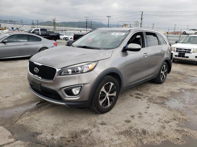 KIA SORENTO EX 2016 with VIN 5XYPH4A57GG175004 - Photo from auction