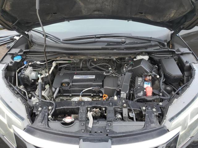 Photo 11 from auction – 2015 HONDA CR-V with VIN 5J6RM4H97FL028630
