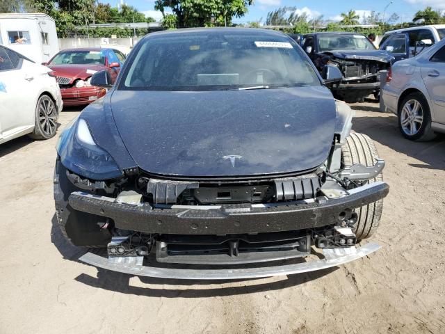 Photo 5 from auction – 2022 TESLA MODEL 3 with VIN 5YJ3E1EA9NF337300