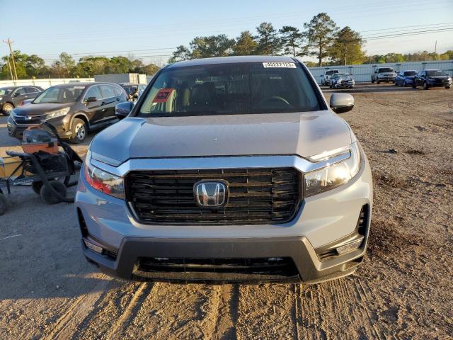 Photo 5 from auction – 2023 HONDA RIDGELINE with VIN 5FPYK3F73PB020085