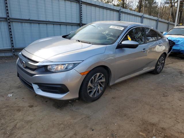 HONDA CIVIC EX 2018 with VIN 19XFC2F7XJE002431 - Photo from auction