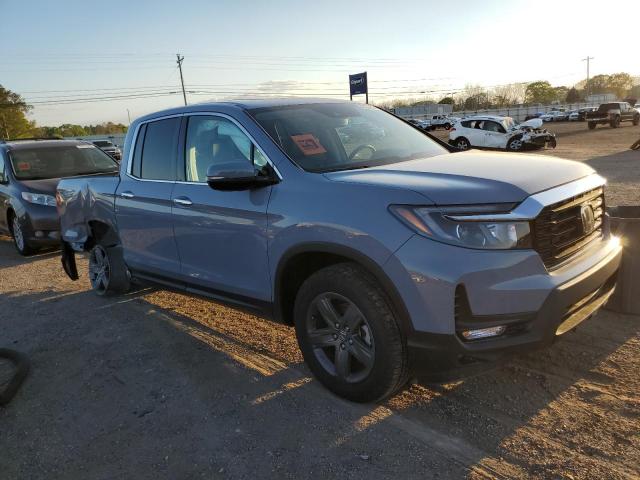 Photo 4 from auction – 2023 HONDA RIDGELINE with VIN 5FPYK3F73PB020085