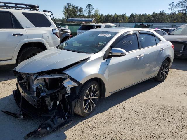 TOYOTA COROLLA L 2018 with VIN 5YFBURHE5JP771692 - Photo from auction