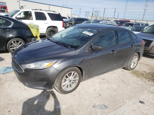 FORD FOCUS SE 2018 with VIN 1FADP3F20JL268771 - Photo from auction
