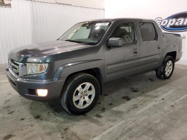 HONDA RIDGELINE 2011 with VIN 5FPYK1F46BB011027 - Photo from auction