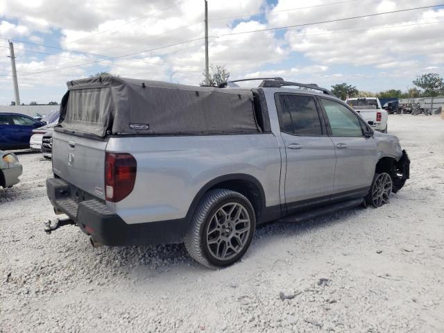 Photo 3 from auction – 2021 HONDA RIDGELINE with VIN 5FPYK3F12MB001020