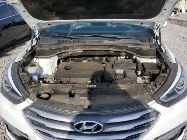 Photo 11 from auction – 2017 HYUNDAI SANTA FE S with VIN 5NMZU3LB7HH048777