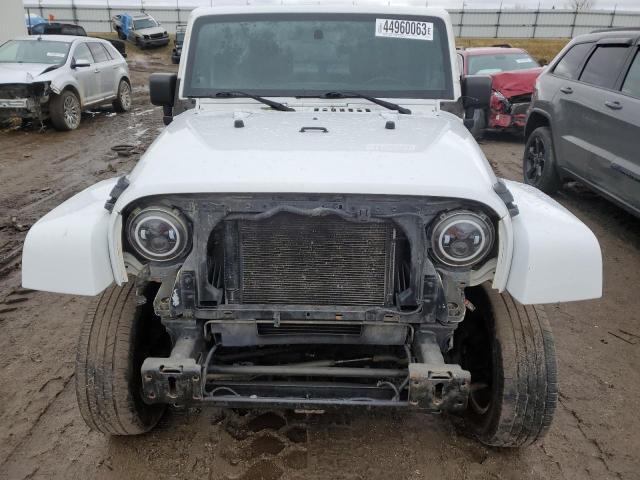 Photo 5 from auction – 2011 JEEP WRANGLER U with VIN 1J4BA5H13BL572501