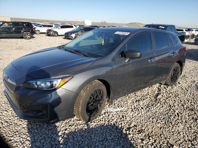 SUBARU IMPREZA 2018 with VIN 4S3GTAA64J3701204 - Photo from auction