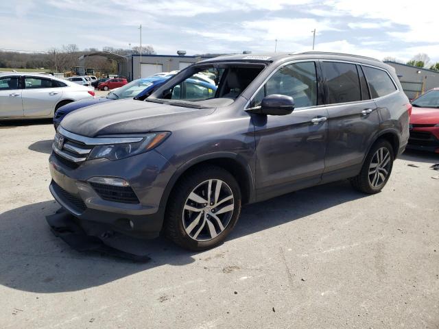 HONDA PILOT TOUR 2017 with VIN 5FNYF6H92HB047910 - Photo from auction