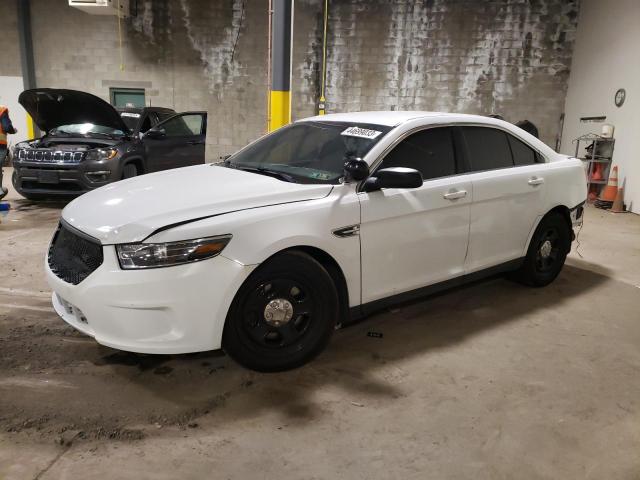 FORD TAURUS POL 2015 with VIN 1FAHP2MK0FG112759 - Photo from auction