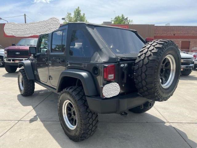 Photo 3 from auction – 2014 JEEP WRANGLER U with VIN 1C4BJWFG0EL233301