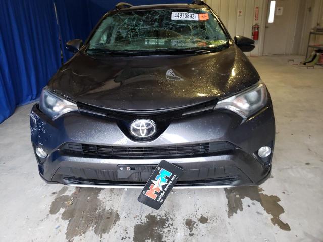 Photo 5 from auction – 2017 TOYOTA RAV4 XLE with VIN JTMRFREV0HJ115492