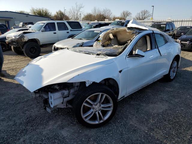 TESLA MODEL S 2014 with VIN 5YJSA1H12EFP49514 - Photo from auction