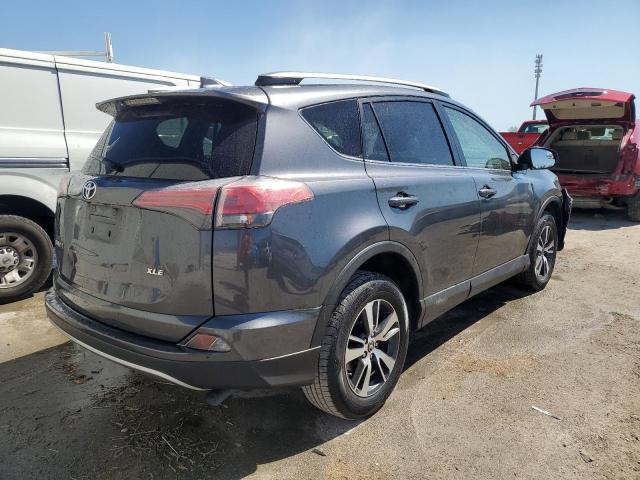 Photo 3 from auction – 2017 TOYOTA RAV4 XLE with VIN JTMWFREV2HD099863