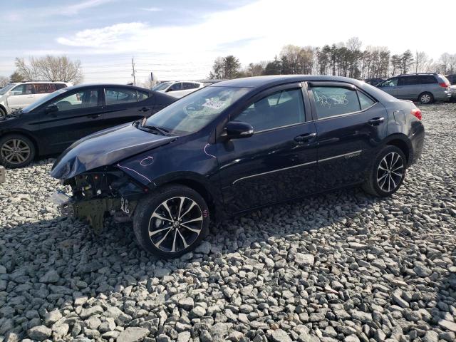 TOYOTA COROLLA L 2019 with VIN 5YFBURHE5KP879554 - Photo from auction