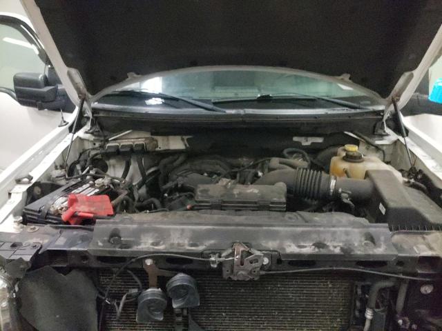 Photo 11 from auction – 2014 FORD F150 with VIN 1FTMF1CM7EKE14828