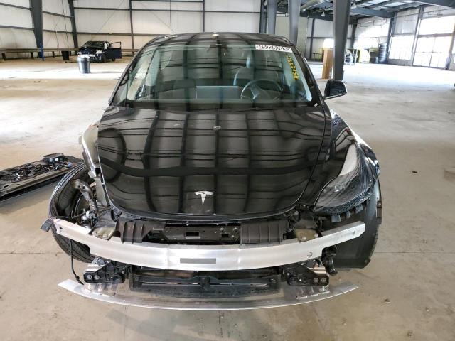 Photo 5 from auction – 2022 TESLA MODEL 3 with VIN 5YJ3E1EA3NF288014