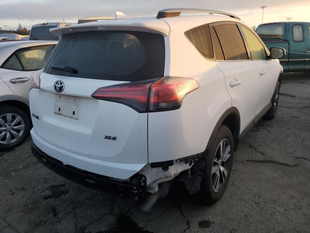 Photo 3 from auction – 2017 TOYOTA RAV4 XLE with VIN JTMWFREV0HJ714833
