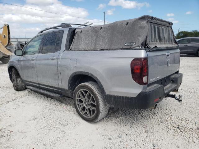 Photo 2 from auction – 2021 HONDA RIDGELINE with VIN 5FPYK3F12MB001020