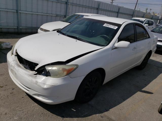 TOYOTA CAMRY LE 2004 with VIN 4T1BF32K44U068514 - Photo from auction