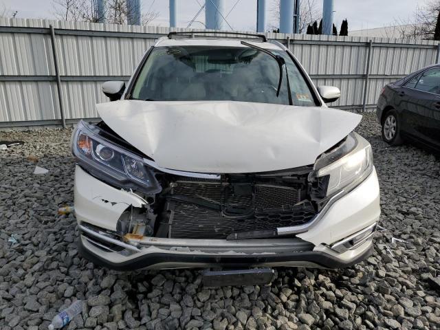 Photo 5 from auction – 2015 HONDA CR-V TOURI with VIN 5J6RM4H99FL076811