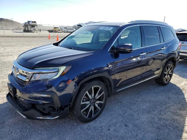 HONDA PILOT TOUR 2019 with VIN 5FNYF6H92KB064536 - Photo from auction