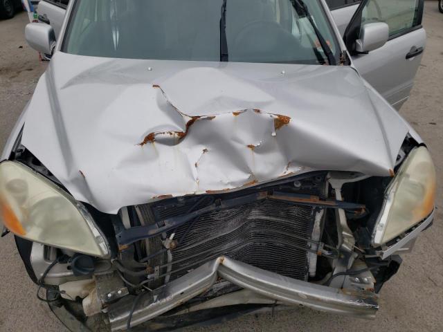 Photo 12 from auction – 2004 HONDA PILOT EX with VIN 2HKYF18434H503108