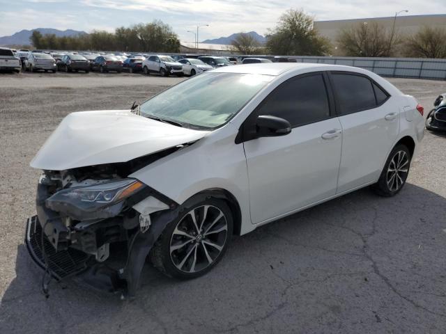 TOYOTA COROLLA L 2017 with VIN 5YFBURHE1HP673592 - Photo from auction