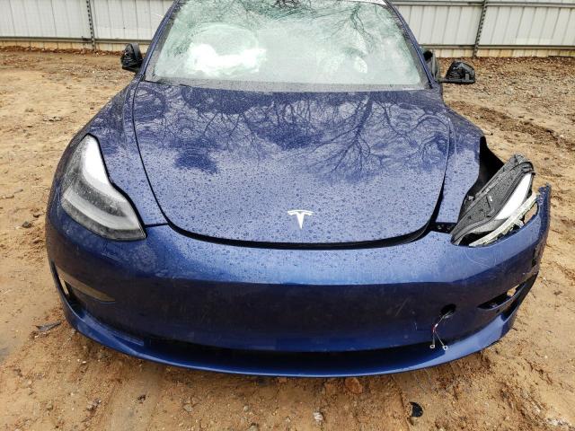 Photo 11 from auction – 2021 TESLA MODEL 3 with VIN 5YJ3E1EA5MF063091