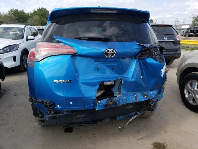 Photo 6 from auction – 2018 TOYOTA RAV4 LE with VIN JTMZFREV7JJ152187
