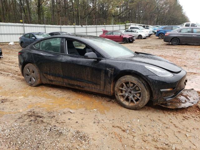 Photo 4 from auction – 2021 TESLA MODEL 3 with VIN 5YJ3E1EA0MF042990