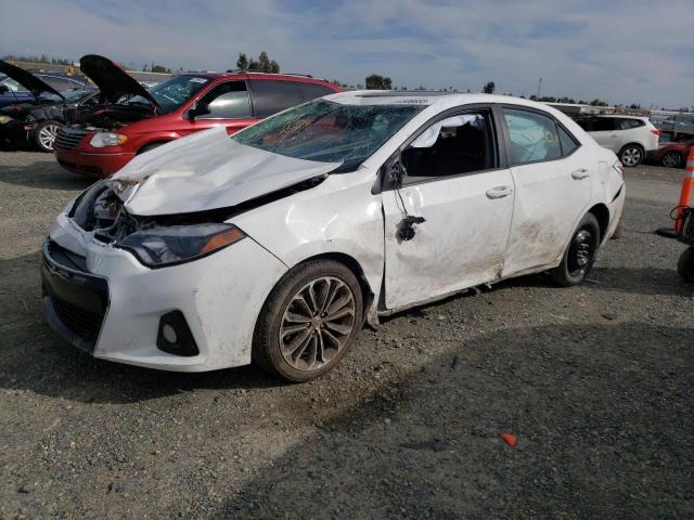 TOYOTA COROLLA L 2015 with VIN 2T1BURHE2FC380586 - Photo from auction