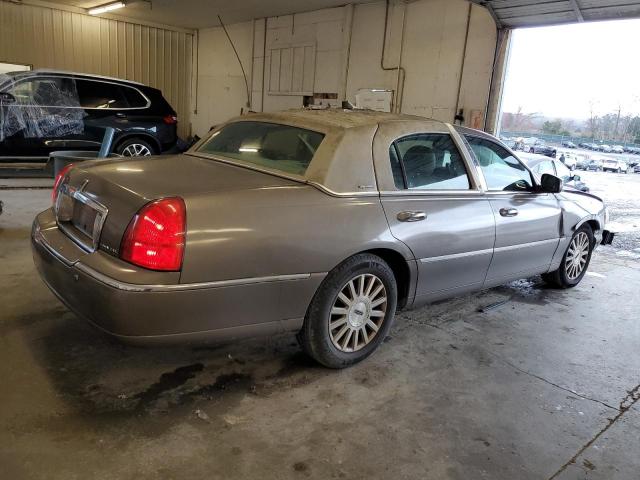 Photo 3 from auction – 2004 LINCOLN TOWN CAR E with VIN 1LNHM81W14Y652489