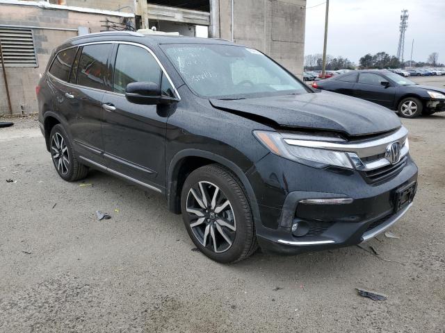 Photo 4 from auction – 2021 HONDA PILOT TOUR with VIN 5FNYF6H97MB009941
