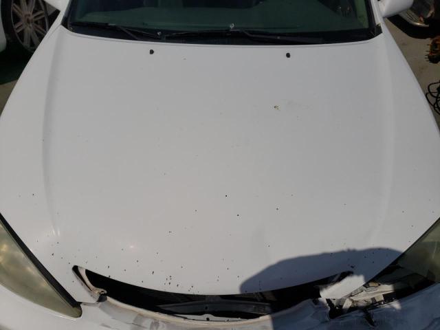 Photo 11 from auction – 2004 TOYOTA CAMRY LE with VIN 4T1BF32K44U068514