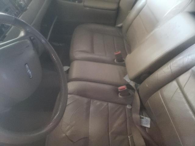 Photo 7 from auction – 2001 LINCOLN TOWN CAR E with VIN 1LNHM81WX1Y710773